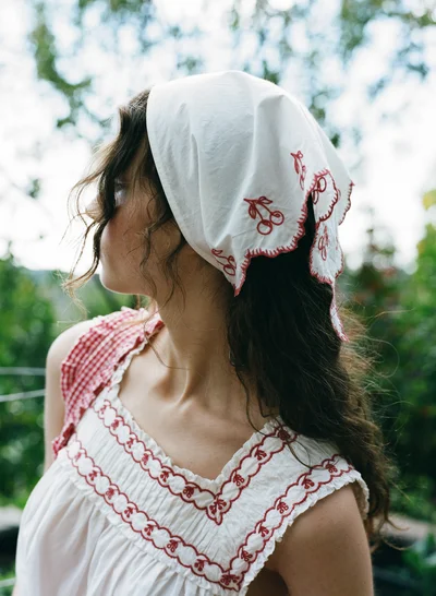 Photo of Cherry Embroidred Poplin Headscarf in White on model, view 1